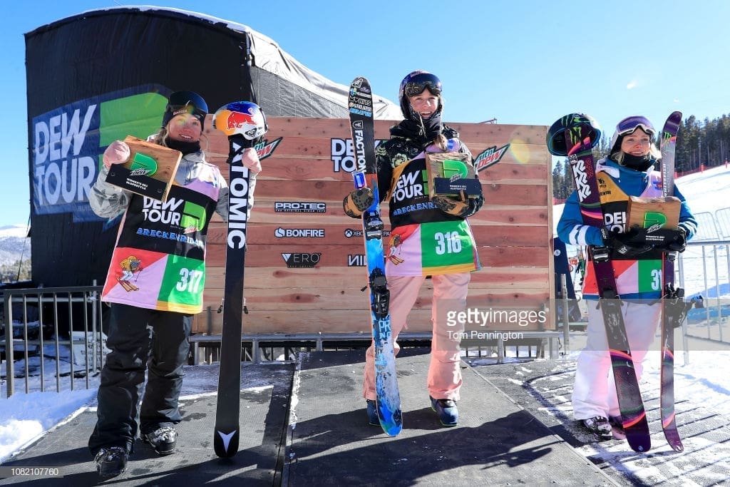 Tess Ledeux of France in second place, Kelly Sildaru of Estonia in first place and Maggie Voisin of the United States in third place celebrate on the podium in Women's Ski Slopestyle during Day 1 of the Dew Tour on December 13, 2018 in Breckenridge, Colorado.